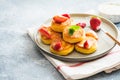 Cottage cheese pancakes, ricotta fritters or syrniki with mint and strawberries. Healthy and delicious morning breakfast Royalty Free Stock Photo