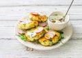 Cottage cheese pancakes with spinach on white plate close up Royalty Free Stock Photo