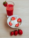 cottage cheese with strawberries in a white bowl and strawberry juice. Ingredients. Side view. Healthy breakfast. Royalty Free Stock Photo