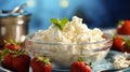 Cottage cheese with strawberry and fork on blue background closeup Royalty Free Stock Photo