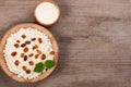 Cottage cheese in a wooden bowl on old wooden background with copy space for your text. Top view Royalty Free Stock Photo