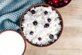Cottage cheese on a wooden table close up Royalty Free Stock Photo