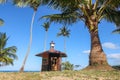 Cottage on the coconut beach. The clock tower or lifeguard tower , Hut against the blue sky Royalty Free Stock Photo