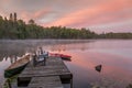 Cottage Dock on a Canadian Lake at Dawn at Dawn Royalty Free Stock Photo