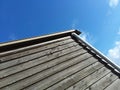 Cottage farm gutter with blue sky Royalty Free Stock Photo