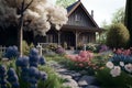 Cottage garden with spring flowers. Countryside house garden