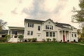 cottage house in american neighborhood. suburban house property. real estate. architectural house in suburban america Royalty Free Stock Photo