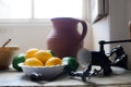 Cottage kitchen. Lemons on a vintage English country kitchen tab Royalty Free Stock Photo