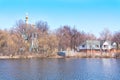 Cottage by the lake in the background of the temple Royalty Free Stock Photo