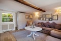 Cottage living room with sofas and picture frames