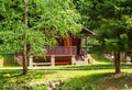 Cottage of the log. House of extruded wooden profile.