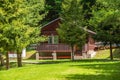 Cottage of the log. House of extruded wooden profile.