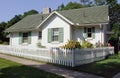 Cottage with Picket Fence Royalty Free Stock Photo