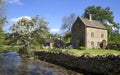 Cottage by a river Royalty Free Stock Photo