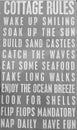 Cottage rules print on wood Royalty Free Stock Photo