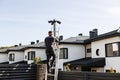 Cottage Security Network: Surveillance Cameras on Metal Post Installation Royalty Free Stock Photo