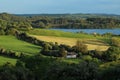 Cottage by lake, set amongst rolling hills, County Leitrim, Ireland Royalty Free Stock Photo