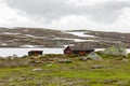 Cottage on shore of lake in Norwegian style