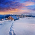 Cottage in snowy mountains with fabulous winter trees Royalty Free Stock Photo