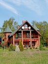 Cottage with two towers and tile roof Royalty Free Stock Photo