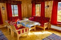 Cottage vacation interior decoration. Wooden living room in Norway