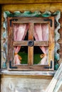 Cottage window with curtains Royalty Free Stock Photo