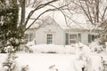 Cottage in winter snowstorm Royalty Free Stock Photo