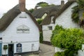 Cottages cluster around the public house in picturesque Helford village on the Helford Estuary Royalty Free Stock Photo