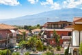 Cottages in Giardini Naxos city and view of Etna