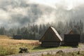 Cottages in the valley on a misty morning Royalty Free Stock Photo