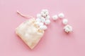 Cotton baby balls with cotton flowers, top view