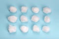 Cotton balls on the blue background Royalty Free Stock Photo