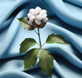Cotton branch with green leaves on knitted background. Royalty Free Stock Photo