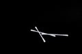 Cotton bud or cotton swab isolated on black background.