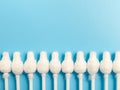 Cotton buds close-up on a light blue background, for children, hygiene and ear cleaning Royalty Free Stock Photo