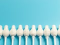 Cotton buds close-up on a light blue background Royalty Free Stock Photo