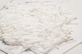 Cotton buds on an  white background. Royalty Free Stock Photo