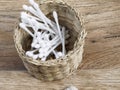 Cotton buds in wicker basket Royalty Free Stock Photo