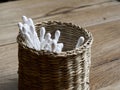 Cotton buds in wicker basket Royalty Free Stock Photo