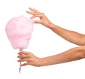 Cotton candy, closeup and woman hands isolated on a white background for sweets, pink food and holiday treat. Person Royalty Free Stock Photo