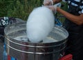 Cotton candy making, sweets for children. Royalty Free Stock Photo