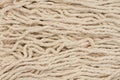 Cotton cleaning beige mop background