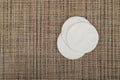 Cotton Disks, Hygiene Pads on Eco Linen Background, Round Facial Sponge, Soft Clear Disk Stack