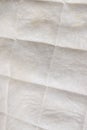 cotton fabric with artificial threads from an old used mattress, quilted Royalty Free Stock Photo