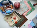 Cotton fabric in different colors and accessories for cutting and sewing