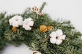 Cotton flower and walnuts in Christmas wreath Royalty Free Stock Photo
