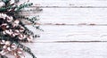 Cotton flowers and eucalyptus branches over a white wooden texture backdrop