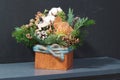 Cotton flowers and wooden reindeers in Christmas table decoration Royalty Free Stock Photo