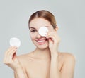 Cotton pad woman face, cosmetology and remover makeup. Royalty Free Stock Photo