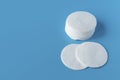 Cotton pads for skin care, for cleansing the face of cosmetics with tonic or micellar cleansing water. Cosmetic products Royalty Free Stock Photo